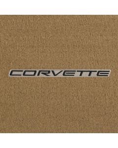 Lloyd Mats ® - Velourtex Tan Standard Deck Mat For Corvette C5 Coupe with Black Corvette Lettering on Beige Applique